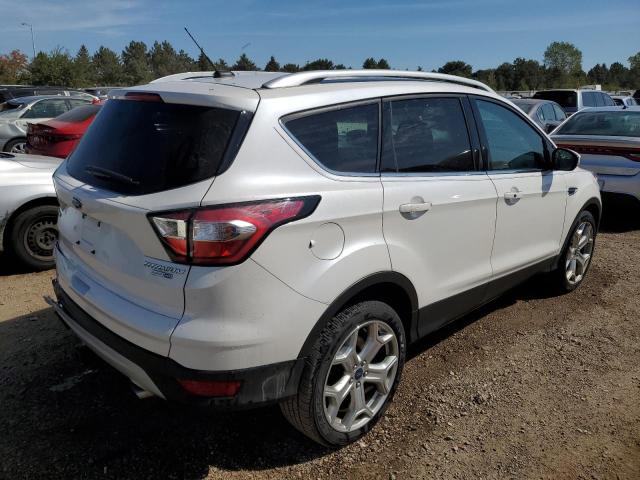 Photo 3 from auction – 2017 FORD ESCAPE TIT with VIN 1FMCU9J99HUC45110