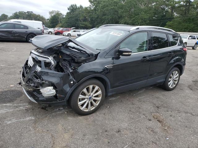 FORD ESCAPE TIT 2017 with VIN 1FMCU9JD3HUC31417 - Photo from auction