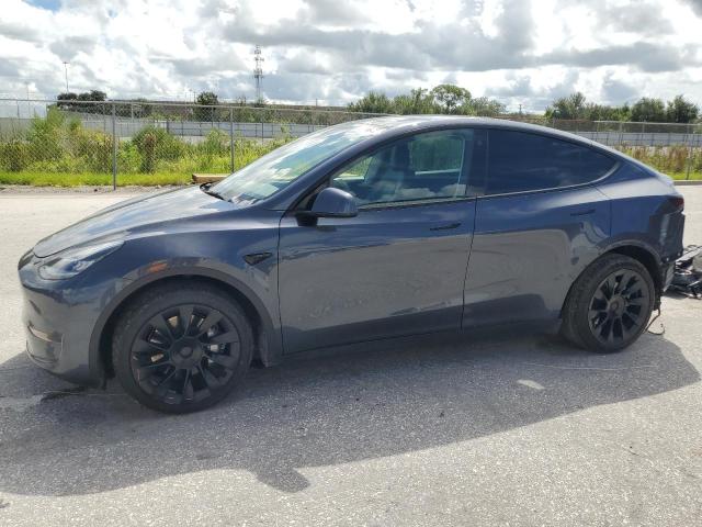 TESLA MODEL Y 2022 with VIN 7SAYGDEE2NF480595 - Photo from auction