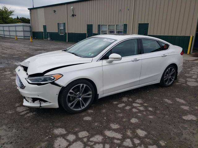 FORD FUSION TIT 2017 with VIN 3FA6P0K90HR138995 - Photo from auction