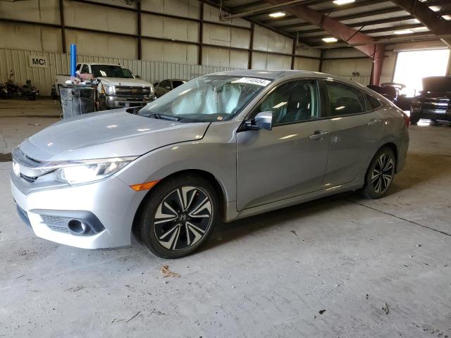 HONDA CIVIC EX 2018 with VIN JHMFC1F30JX022435 - Photo from auction