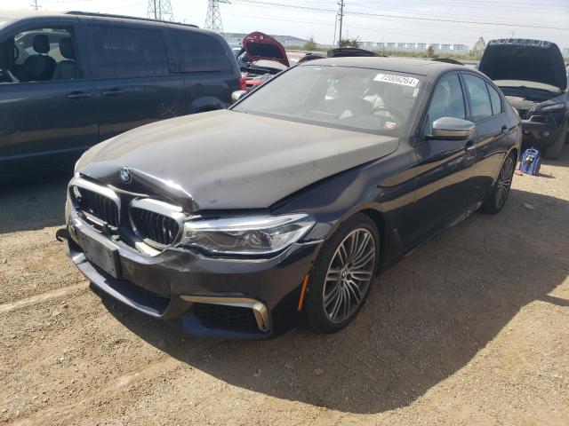 BMW M550XI 2018 with VIN WBAJB9C53JB049710 - Photo from auction
