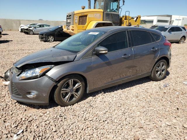FORD FOCUS SE 2014 with VIN 1FADP3K24EL374877 - Photo from auction