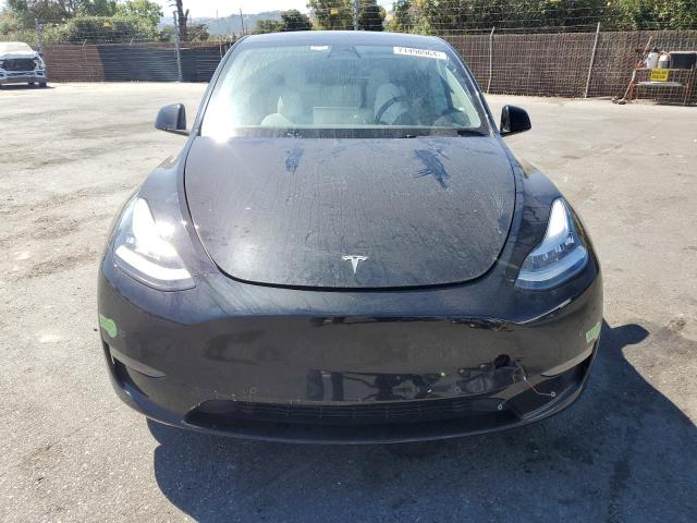 Photo 5 from auction – 2022 TESLA MODEL Y with VIN 7SAYGAEE8NF570333