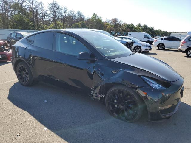 Photo 4 from auction – 2022 TESLA MODEL Y with VIN 7SAYGDEE7NF448371