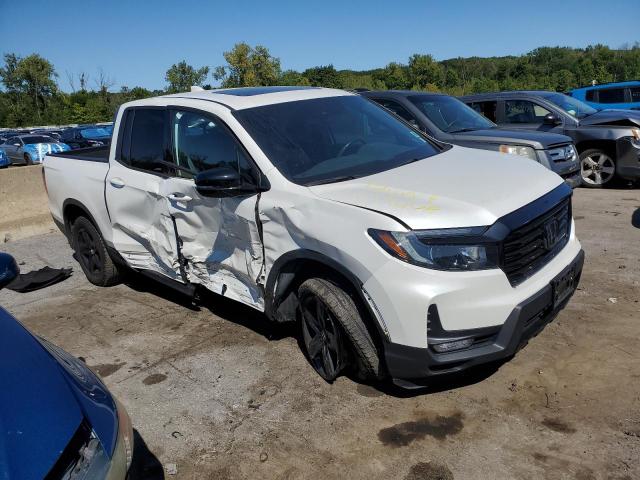 Photo 4 from auction – 2022 HONDA RIDGELINE with VIN 5FPYK3F81NB013609