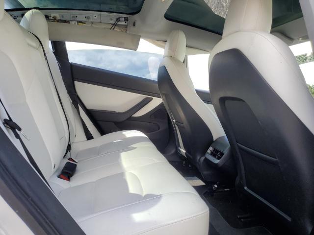 Photo 10 from auction – 2021 TESLA MODEL 3 with VIN 5YJ3E1EA4MF938838