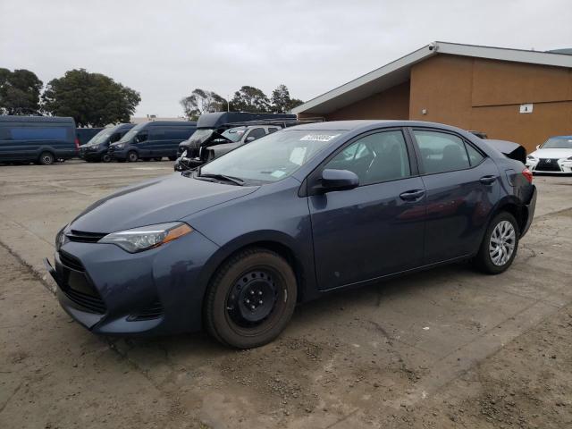 TOYOTA COROLLA L 2019 with VIN 5YFBURHE0KP887836 - Photo from auction