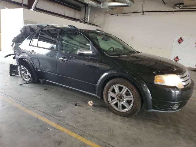 Photo 4 from auction – 2009 FORD TAURUS X L with VIN 1FMDK06W99GA02255