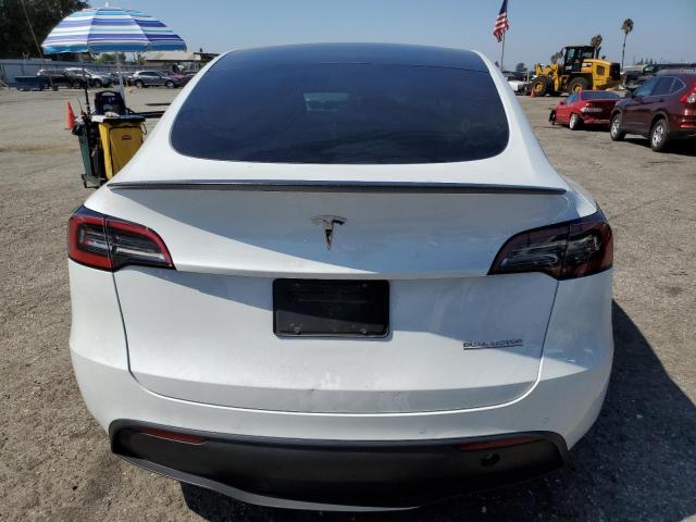 Снимка 6 от търг – 2022 TESLA MODEL Y с VIN 7SAYGDEF0NF394002
