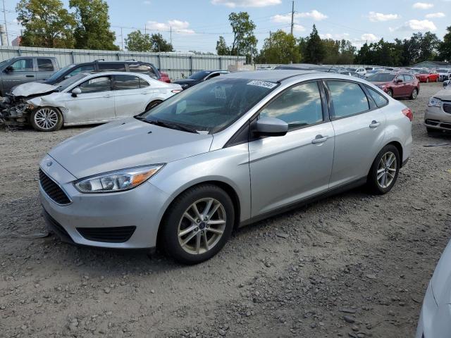 FORD FOCUS SE 2018 with VIN 1FADP3F22JL321261 - Photo from auction