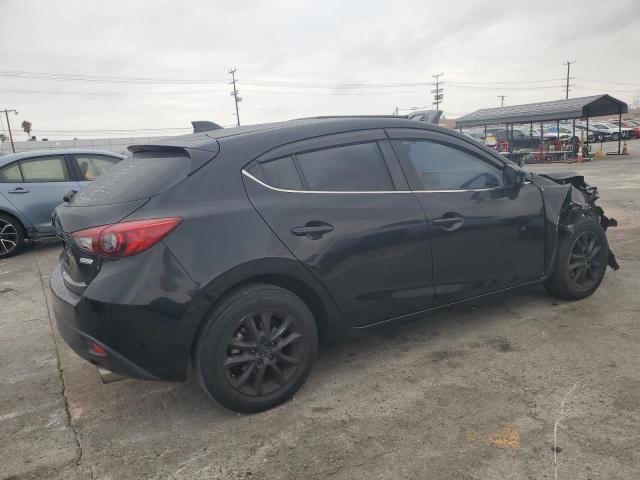 Photo 3 from auction – 2014 MAZDA 3 TOURING with VIN JM1BM1L7XE1212093