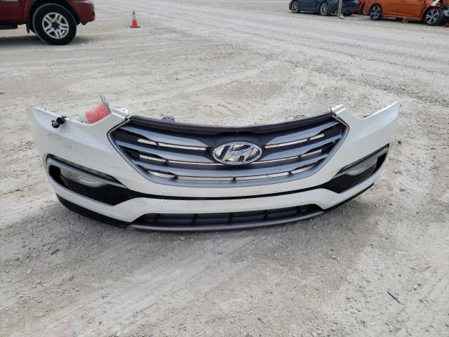 Photo 12 from auction – 2017 HYUNDAI SANTA FE S with VIN 5NMZU3LB0HH039337