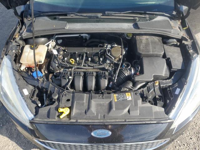 Photo 11 from auction – 2015 FORD FOCUS SE with VIN 1FADP3F29FL280537