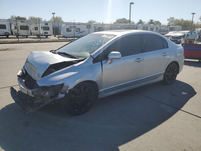 HONDA CIVIC EXL 2011 with VIN 2HGFA1F90BH521996 - Photo from auction