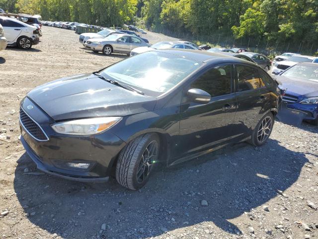 FORD FOCUS SE 2015 with VIN 1FADP3F25FL209836 - Photo from auction
