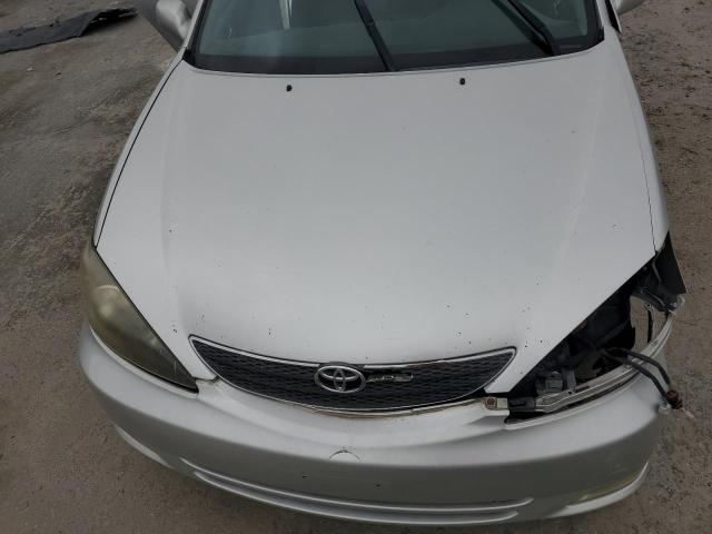 Photo 11 from auction – 2004 TOYOTA CAMRY LE with VIN 4T1BE32K04U880542