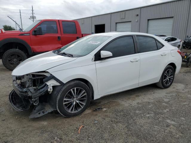 TOYOTA COROLLA L 2016 with VIN 5YFBURHE4GP381207 - Photo from auction