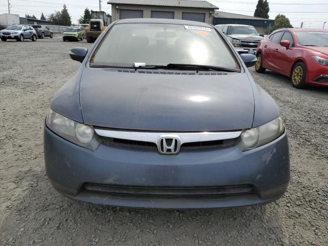 Photo 5 from auction – 2006 HONDA CIVIC HYBR with VIN JHMFA36296S025654