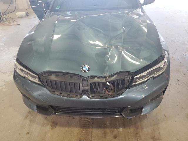 Photo 11 from auction – 2021 BMW 330XI with VIN WBA5R7C01MFK86974