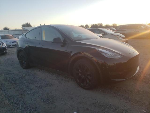 Photo 4 from auction – 2022 TESLA MODEL Y with VIN 7SAYGDEE0NF504893