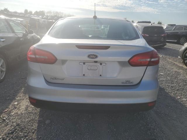 Photo 6 from auction – 2015 FORD FOCUS SE with VIN 1FADP3F28FL344034