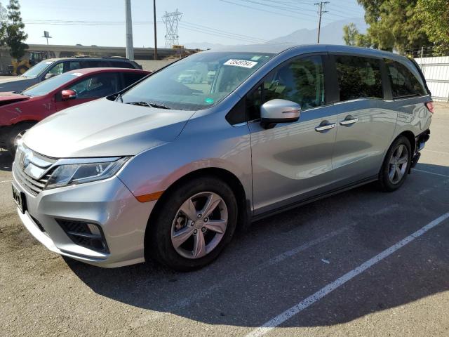 HONDA ODYSSEY EX 2018 with VIN 5FNRL6H77JB032434 - Photo from auction