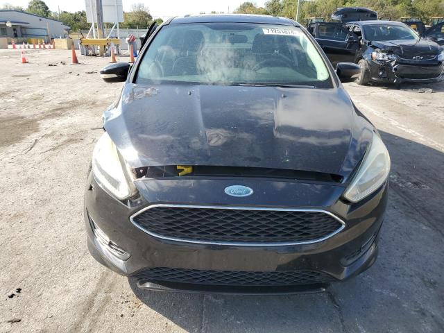 Photo 5 from auction – 2015 FORD FOCUS SE with VIN 1FADP3F28FL304231