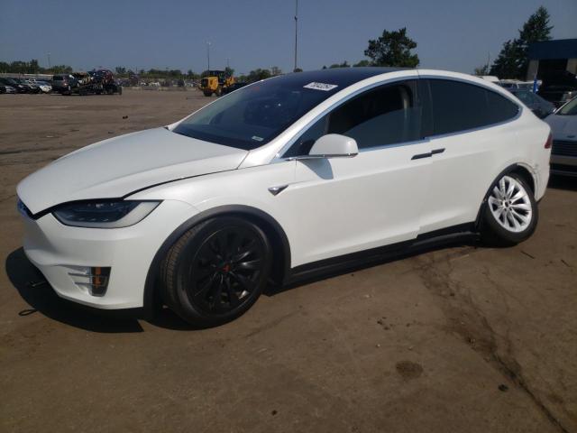 TESLA MODEL X 2017 with VIN 5YJXCBE23HF047712 - Photo from auction