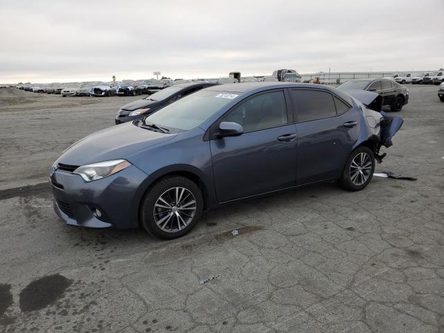 TOYOTA COROLLA L 2016 with VIN 5YFBURHE1GP422831 - Photo from auction