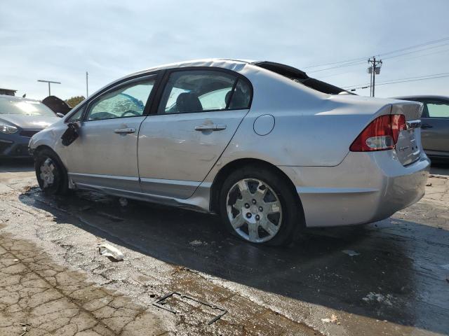 Photo 2 from auction – 2010 HONDA CIVIC LX with VIN 19XFA1F50AE068596