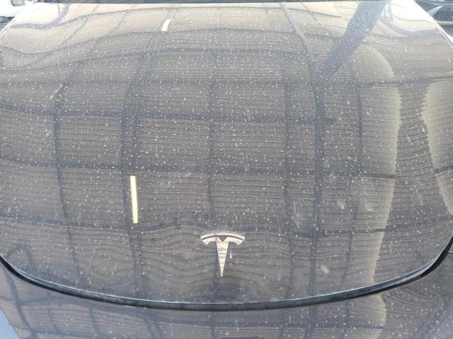 Photo 11 from auction – 2024 TESLA MODEL Y with VIN 7SAYGDEE3RA235002