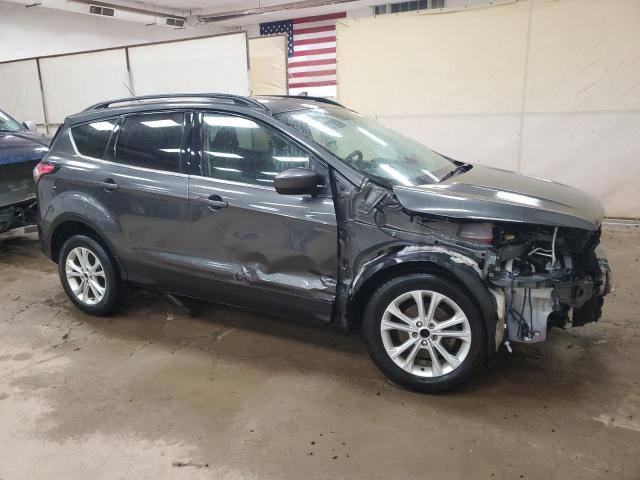 Photo 4 from auction – 2018 FORD ESCAPE SE with VIN 1FMCU0GD1JUB82825