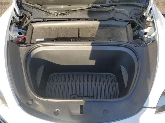 Photo 12 from auction – 2023 TESLA MODEL Y with VIN 7SAYGDEE6PA156615