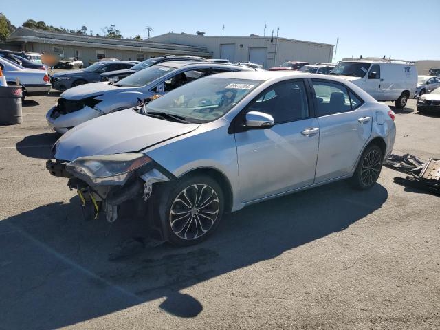 TOYOTA COROLLA L 2015 with VIN 5YFBURHE3FP322180 - Photo from auction