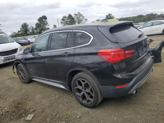 Photo 2 from auction – 2017 BMW X1 XDRIVE2 with VIN WBXHT3C3XH5F85983