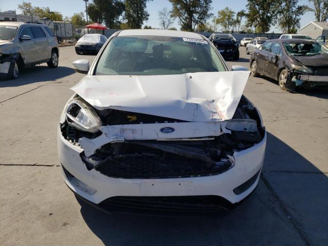 Photo 5 from auction – 2015 FORD FOCUS SE with VIN 1FADP3F25FL210954