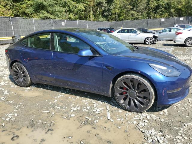 Photo 4 from auction – 2022 TESLA MODEL 3 with VIN 5YJ3E1EC1NF124116