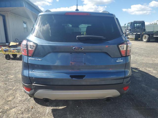 Photo 6 from auction – 2018 FORD ESCAPE SE with VIN 1FMCU0GD2JUC11541
