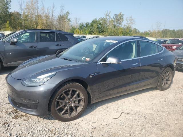 TESLA MODEL 3 2018 with VIN 5YJ3E1EBXJF066007 - Photo from auction