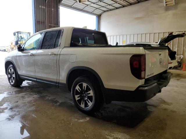 Photo 2 from auction – 2020 HONDA RIDGELINE with VIN 5FPYK3F53LB027353