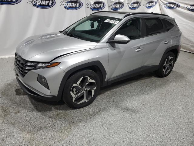 HYUNDAI TUCSON SEL 2022 with VIN 5NMJFCAE2NH006579 - Photo from auction