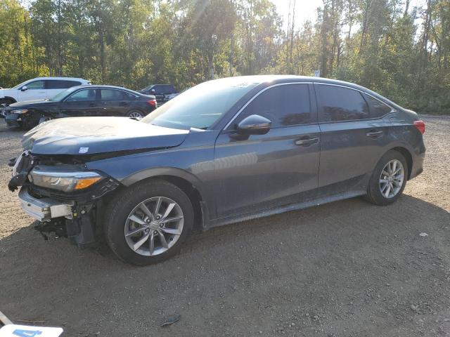 HONDA CIVIC EX 2023 with VIN 2HGFE2F38PH101593 - Photo from auction