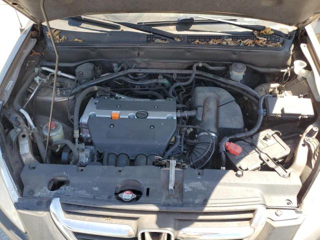 Photo 12 from auction – 2004 HONDA CR-V with VIN JHLRD68514C002376