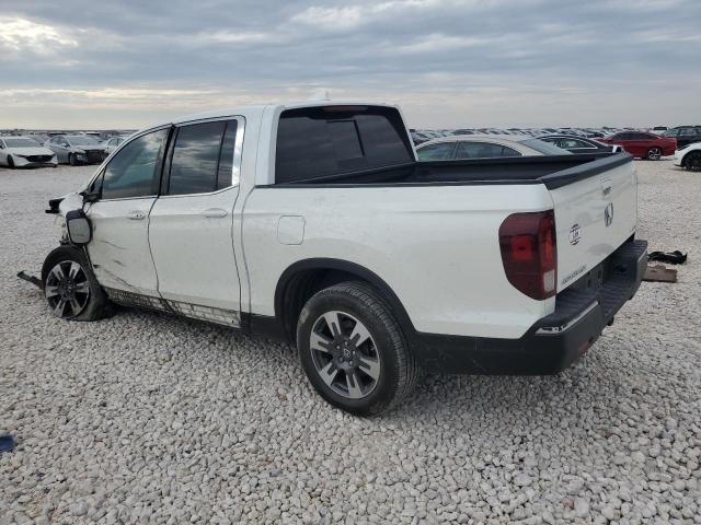 Photo 2 from auction – 2019 HONDA RIDGELINE with VIN 5FPYK3F67KB001720