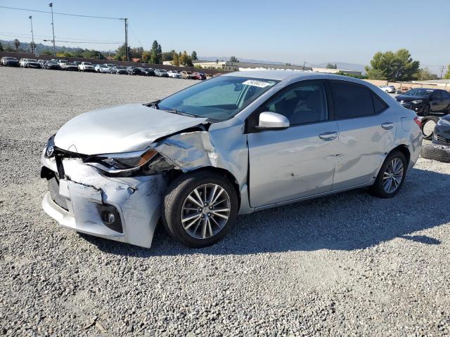 TOYOTA COROLLA L 2015 with VIN 5YFBURHEXFP201999 - Photo from auction