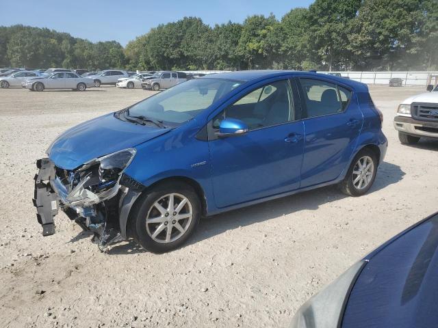 TOYOTA PRIUS C 2015 with VIN JTDKDTB33F1108086 - Photo from auction