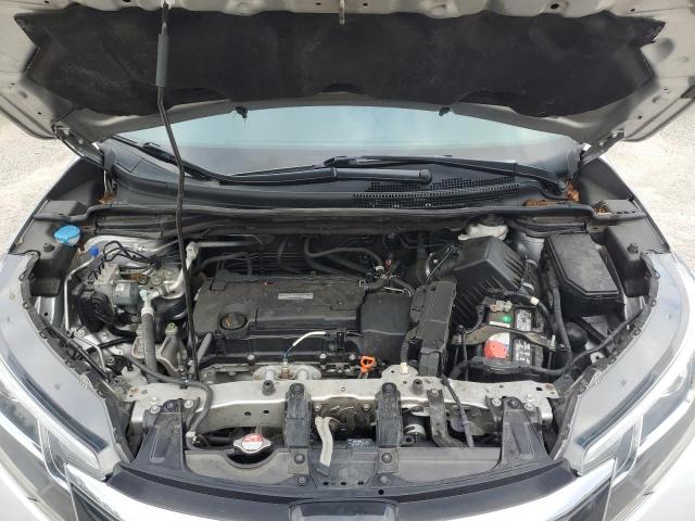 Photo 12 from auction – 2016 HONDA CRV AWD with VIN 5J6RM4H97GL131113