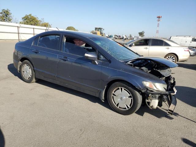 Photo 4 from auction – 2010 HONDA CIVIC HYBR with VIN JHMFA3F23AS001729
