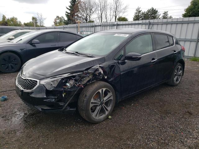 KIA FORTE EX 2014 with VIN KNAFX5A82E5210839 - Photo from auction